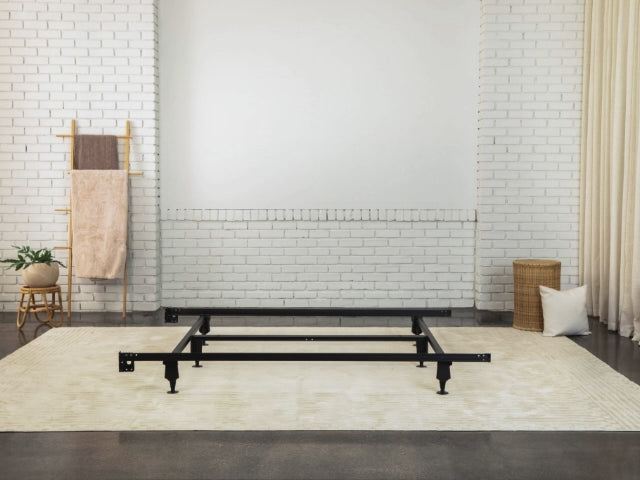 Stop-motion video starting with an image of a metal bed frame, followed by a foundation placed on top of it, then a mattress, and finally the mattress being dressed.