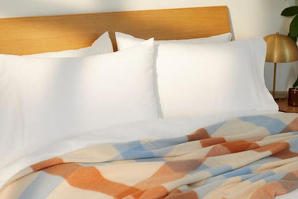 Bold Plaid Throw blanket, autumn, on a bed